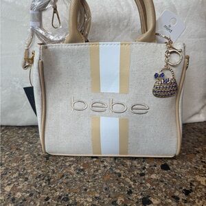 Bebe Mini Tote Beige & White Stripe Top-Handle Satchel with Charm